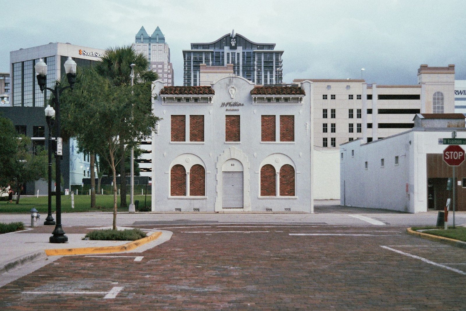 Historic downtown Orlando building blending old and modern architecture.