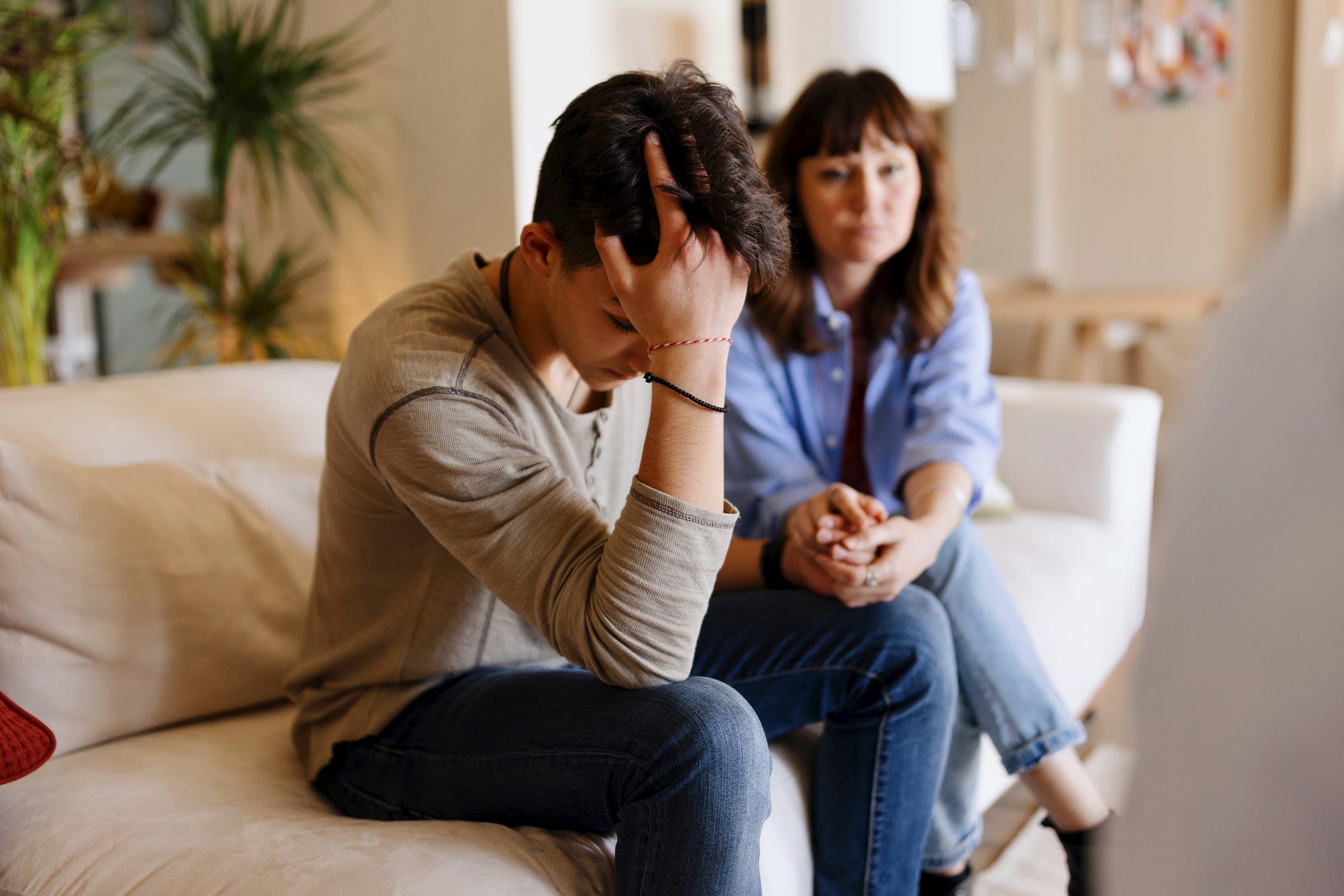 Mother and son doing a psychotherapy
