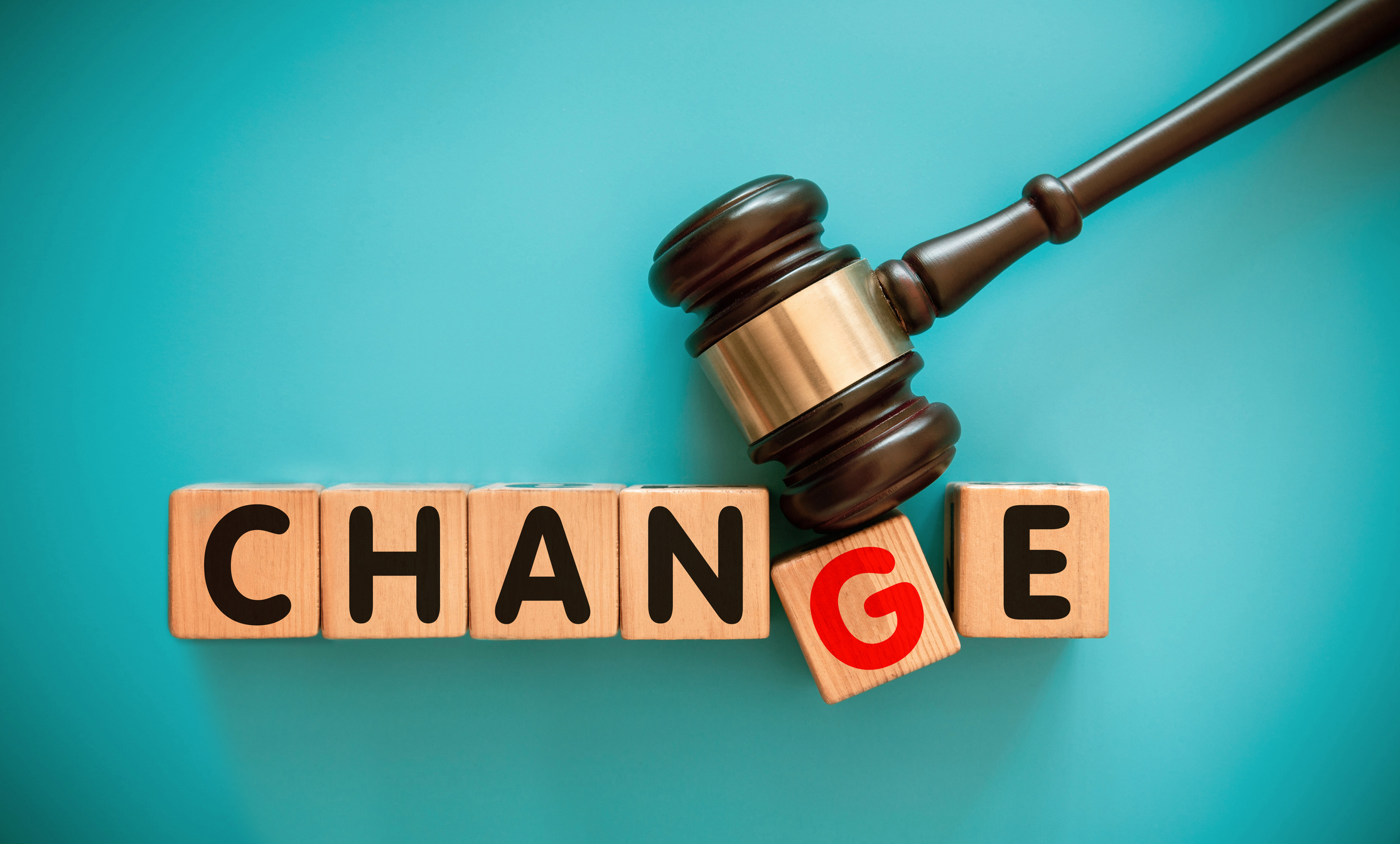 Gavel and toy block with "CHANGE"